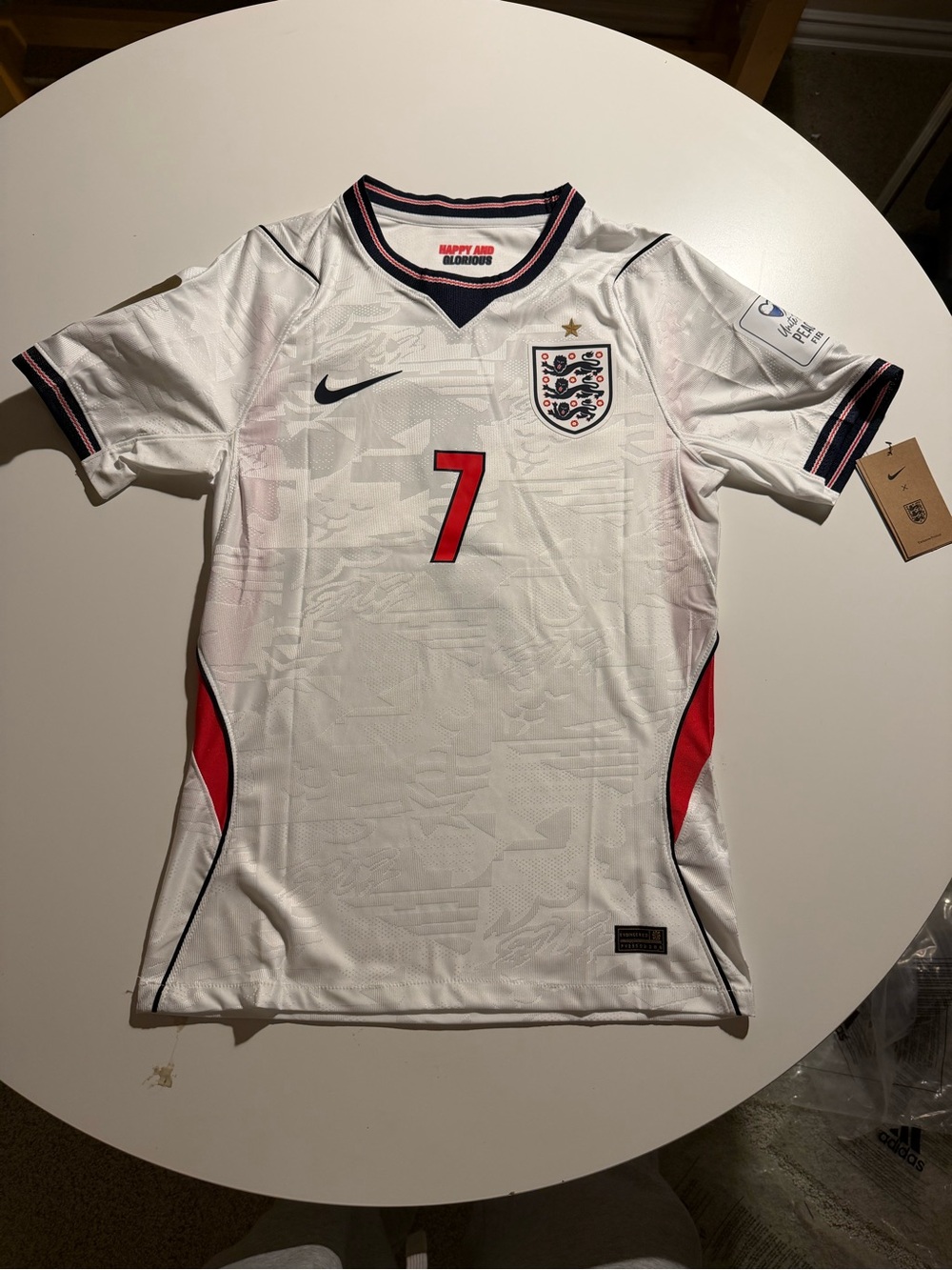Nike SAKA #7 England Men's Football Jersey with Red Accents